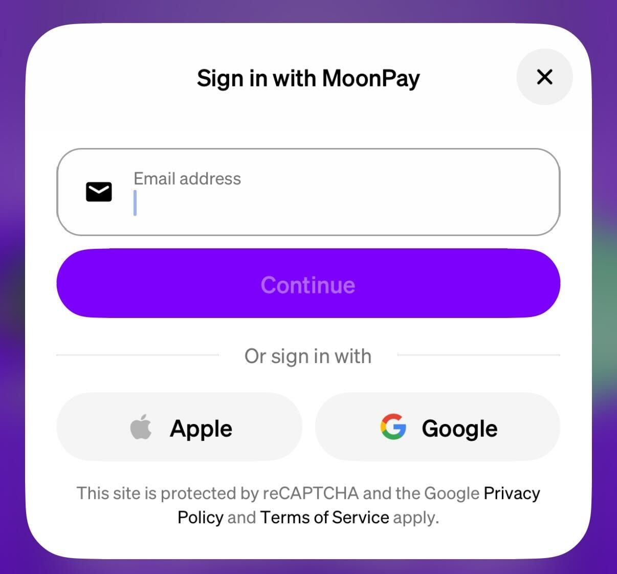 A screenshot of the login screen in the MoonPay app.